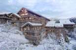 Experience luxury living in this stunning chalet nestled in a winter wonderland.