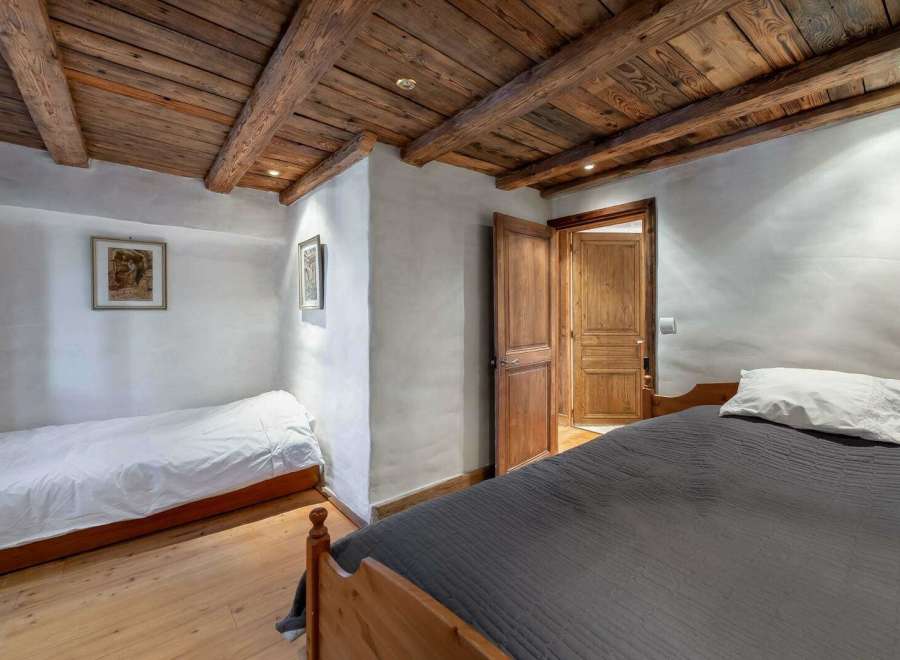 Discover rustic charm in this cozy bedroom.