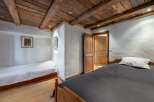 Discover rustic charm in this cozy bedroom.