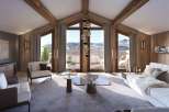 Experience luxury living in this stunning chalet, boasting breathtaking mountain views.