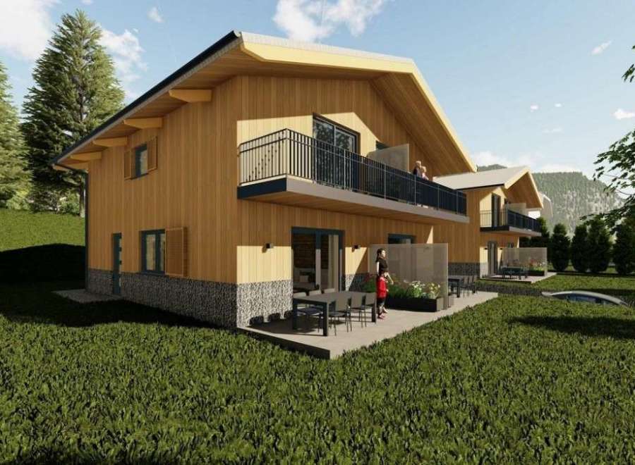 Discover your dream home! This stunning property boasts a modern design with a warm, inviting wooden exterior.