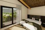 Experience tranquility in this stunning bedroom with a breathtaking view.