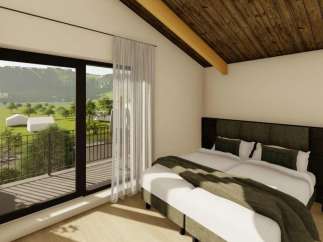 Experience tranquility in this stunning bedroom with a breathtaking view.