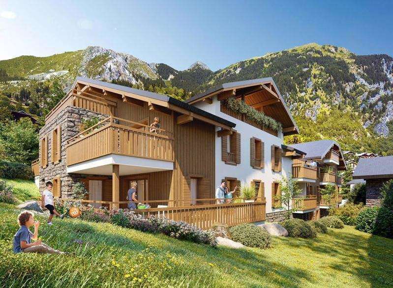 Discover your dream mountain retreat! This stunning property boasts a charming chalet-style design with wooden balconies and stone accents.