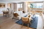 This stunning apartment boasts a spacious open-plan living area with floor-to-ceiling windows offering breathtaking views.