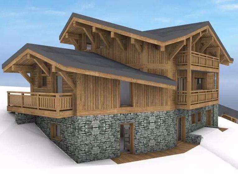 Discover the charm of this stunning wooden chalet, perfectly nestled in a snowy landscape.