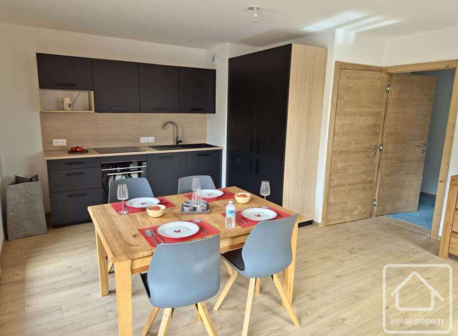 Discover this modern kitchen and dining area, perfect for entertaining or everyday living.