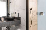 Experience modern luxury in this stunning bathroom.