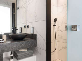 Experience modern luxury in this stunning bathroom.