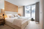 Experience comfort and style in this beautifully designed bedroom.