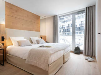 Experience comfort and style in this beautifully designed bedroom.