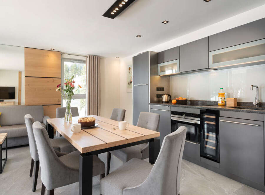 This modern kitchen and dining area is perfect for entertaining.