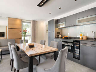 This modern kitchen and dining area is perfect for entertaining.