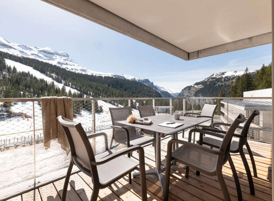 Enjoy breathtaking mountain views from this stunning balcony.