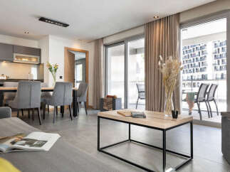 Discover modern living in this stylish apartment, featuring a bright and airy open-plan design.