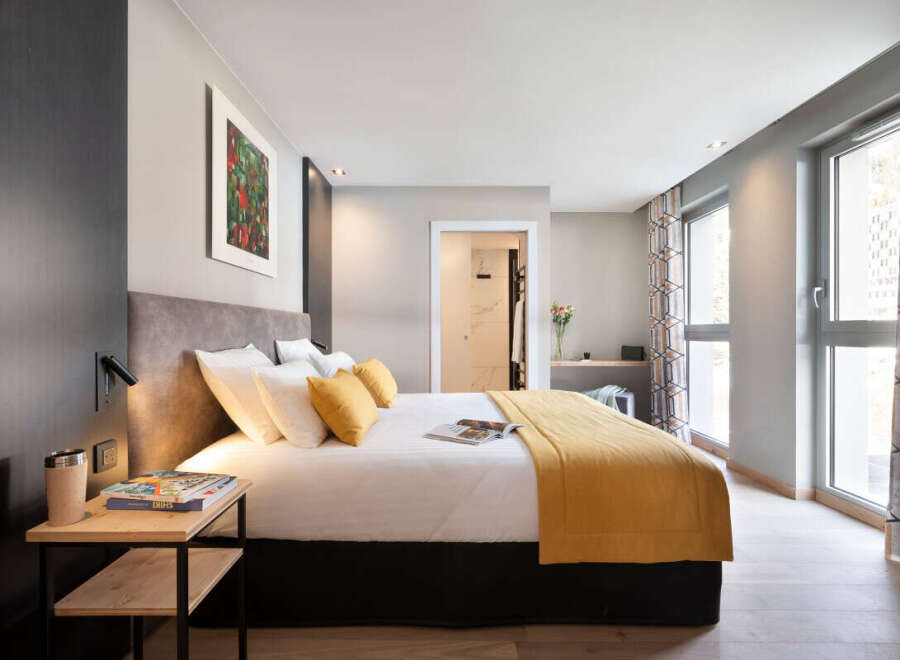 Experience luxury and comfort in this beautifully designed bedroom.