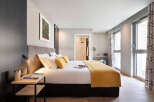 Experience luxury and comfort in this beautifully designed bedroom.