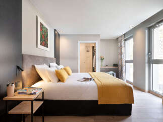Experience luxury and comfort in this beautifully designed bedroom.