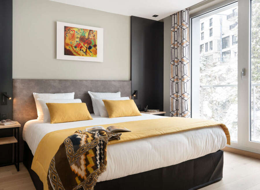 Experience luxury and comfort in this beautifully designed bedroom.