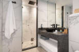 Step into a modern oasis with this stunning bathroom design.