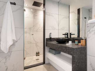 Step into a modern oasis with this stunning bathroom design.