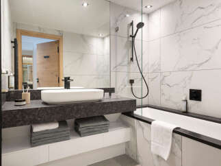Step into luxury with this stunning bathroom featuring a sleek, modern design.