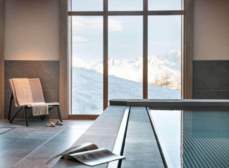 Relax and rejuvenate in our luxurious spa, featuring an indoor pool with stunning mountain views.