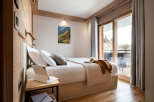 Experience luxury and comfort in this stunning bedroom.