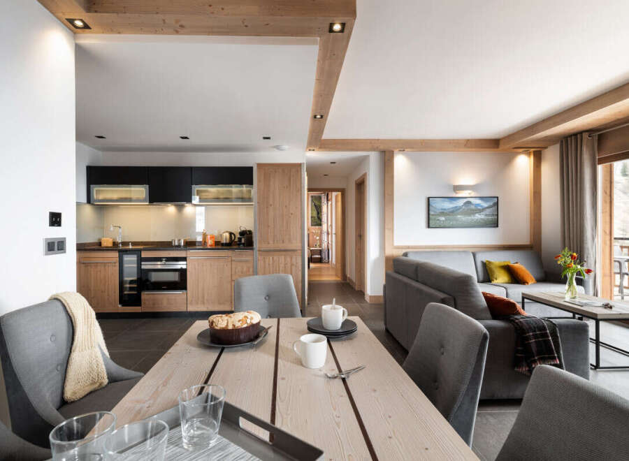 Experience luxury living in this stunning property, featuring a modern kitchen with sleek appliances and ample counter space.