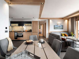Experience luxury living in this stunning property, featuring a modern kitchen with sleek appliances and ample counter space.