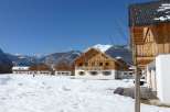 Experience the charm of alpine living in these cozy wooden chalets.
