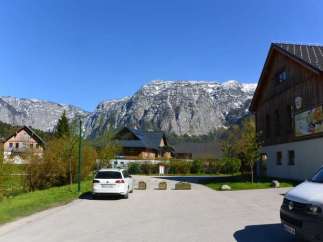 Nestled in a picturesque mountain village, this property offers stunning views of snow-capped peaks.