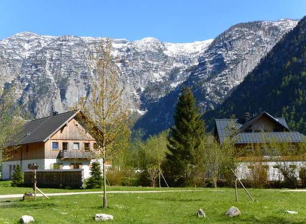 Nestled amidst breathtaking mountain scenery, this charming property offers a serene escape.
