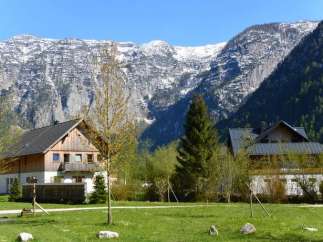 Nestled amidst breathtaking mountain scenery, this charming property offers a serene escape.