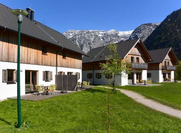 Discover a charming retreat nestled amidst stunning mountain scenery.
