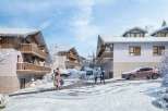 Experience the charm of winter in this stunning property, featuring cozy balconies and a picturesque snowy landscape.