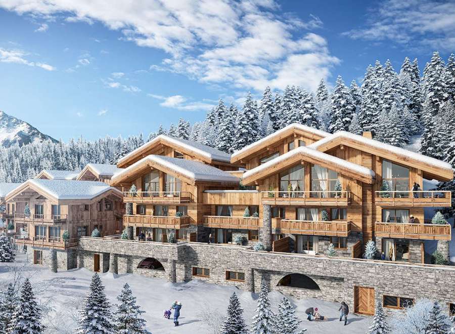 Luxury chalet-style apartments nestled in a snowy mountain setting.