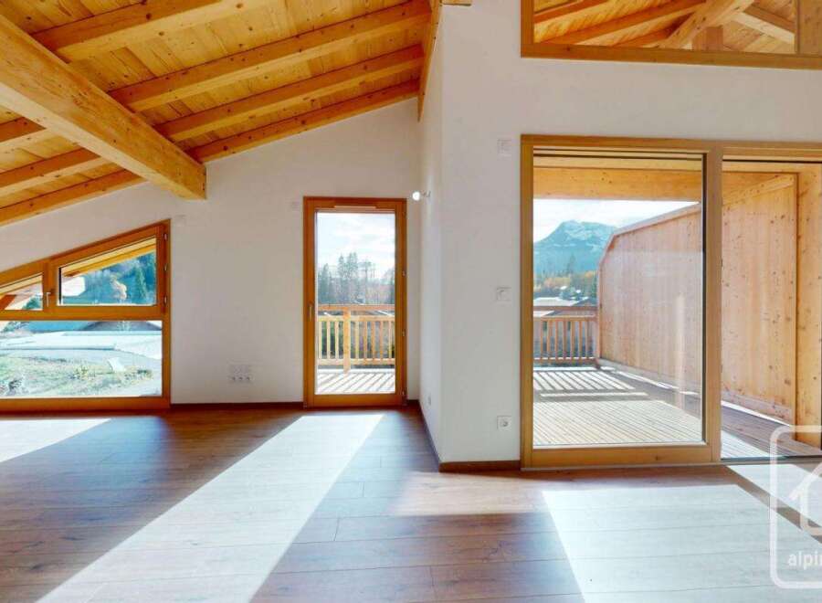 Experience the charm of this stunning property, featuring a bright and airy interior with exposed wooden beams and a modern design.