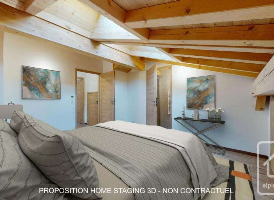 Discover the charm of this stunning bedroom, featuring exposed wooden beams and a unique architectural design.