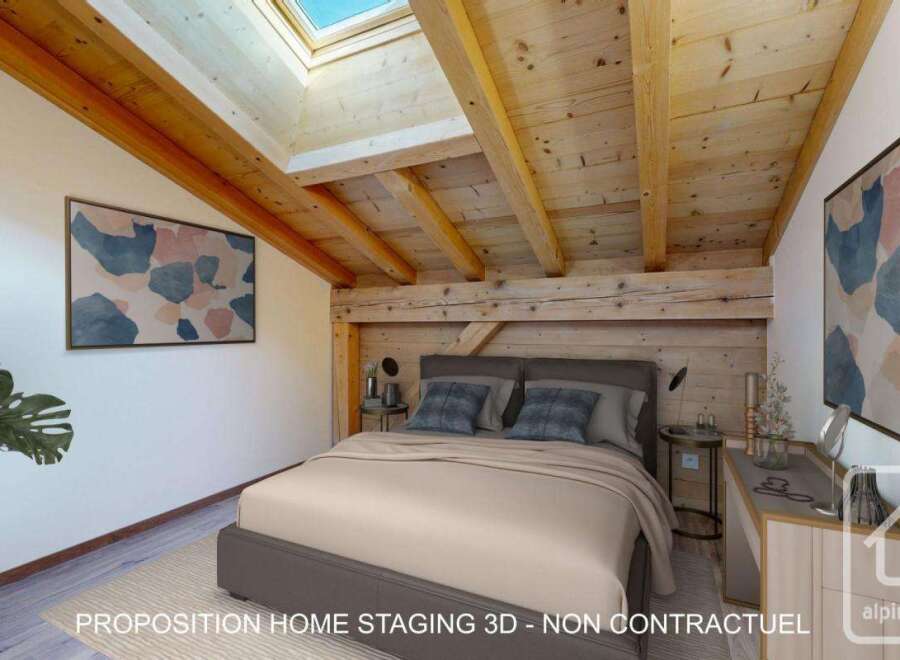 Discover the charm of this stunning bedroom, featuring a unique wooden ceiling and exposed beams that add character and warmth.