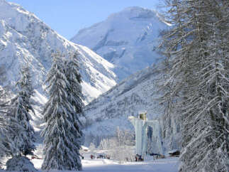 Experience the serenity of winter in this breathtaking mountain landscape.