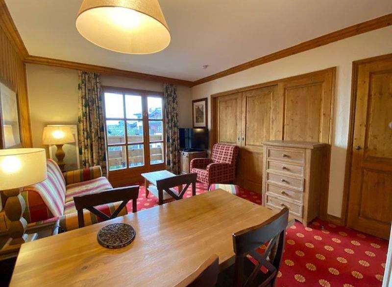 This charming property boasts a cozy living space with a warm, inviting atmosphere.