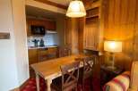 Cozy apartment with a fully equipped kitchen, perfect for preparing meals.