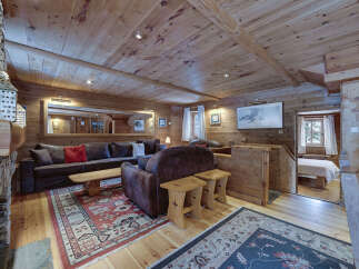 Step into rustic elegance with this stunning cabin-style living space.