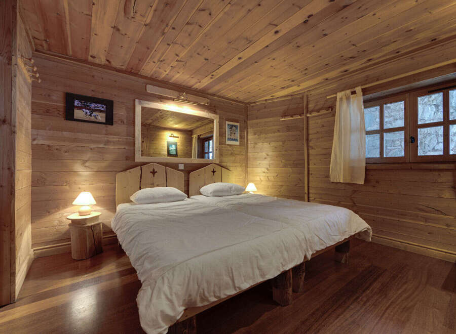 Step into a cozy and inviting bedroom retreat.
