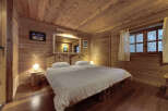 Step into a cozy and inviting bedroom retreat.