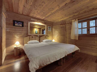 Step into a cozy and inviting bedroom retreat.