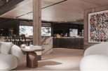 This luxurious chalet boasts a stunning open-plan living area with floor-to-ceiling windows offering breathtaking mountain views.