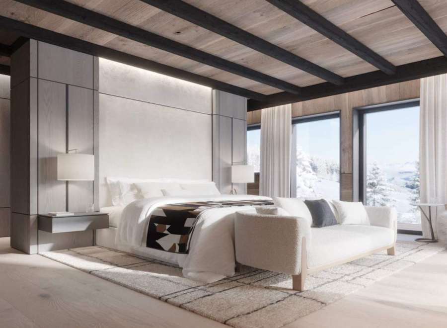 Luxurious mountain retreat boasting a stunning master bedroom with breathtaking views.