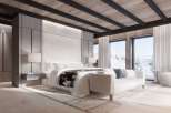 Luxurious mountain retreat boasting a stunning master bedroom with breathtaking views.